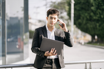Businessman talking on the phone giving professional consultation to client or negotiating project.