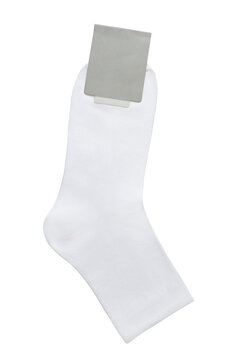 White sock with blank promotional tag and space for text and logo. Isolated on a transparent background. Copy space. Mockup. PNG