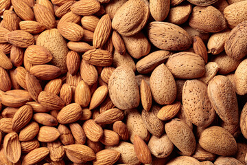 Fototapeta premium Peeled and unpeeled almonds.