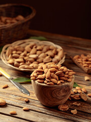 Almond nuts on a wooden table.