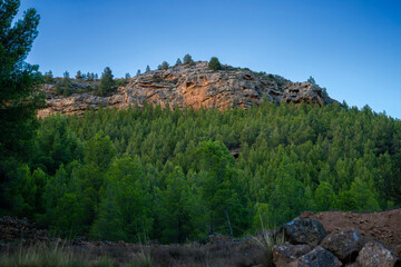 Fototapeta na wymiar Side view of mount La Muela moments before nightfall in Rincón de Ademuz on the Iberian Peninsula