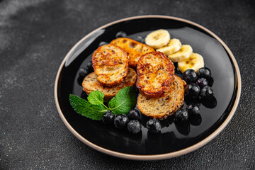 French toast sweet breakfast berries, banana pancakes fresh delicious cooking appetizer meal food snack on the table copy space