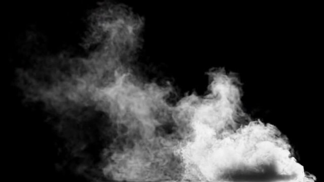 White smoke against the light drifting to the ground. Can be used as a special effect for your projects, video texture or background for designs, scenes, etc. Video in loop.