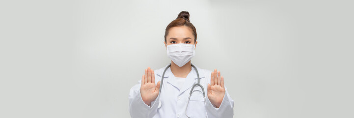 beauty woman doctor show stop to you on the white background
