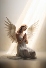 Whole body posture of a beautiful woman angel praying in divine sunlight with wings in kneeing...