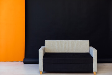 sofa on a black background interior in the room