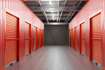 Corridor with storage rooms. Warehouse with closed doors. Storage rooms for private tenants....