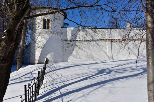 Ancient cloister wall in wintertime