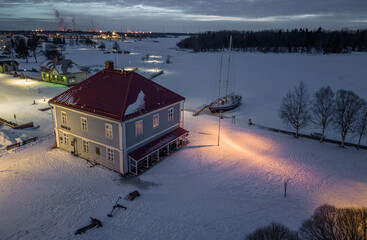 The oldest museum (build in 1862) of local history and culture in Finland at winter. The museum is located in the town of Raahe in Oulu province. - obrazy, fototapety, plakaty