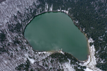 Aerial Drone View of a Volcanic Crater Lake at Winter. Flying Above Sfanta Ana Lake, Szent Anna...