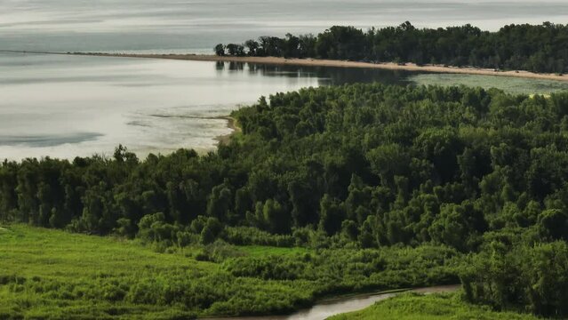 Hardwood Forests Surrounding Lake Pepin In Frontenac State Park In Minnesota, USA. aerial tilt-down