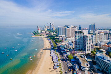 Fototapeta na wymiar Pattaya Thailand, a view of the beach road with hotels and skyscrapers buildings alongside the renovated new beach road. 