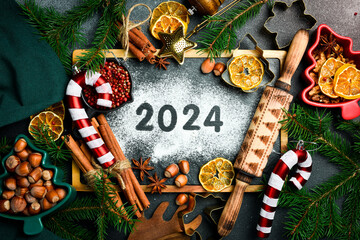 New Year's background. Baking background with text 2024. New Year's card. Top view. Flat lay.