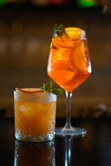 drinks aperol and whisky sour 