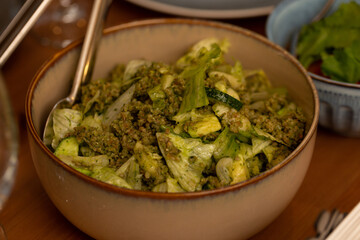 Salad with cereals, green salad and cucumbers
