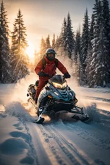 Fotobehang A man wearing a red jacket, a protective helmet and glasses on a snowmobile in winter in the forest against the backdrop of mountains and sunset. © liliyabatyrova