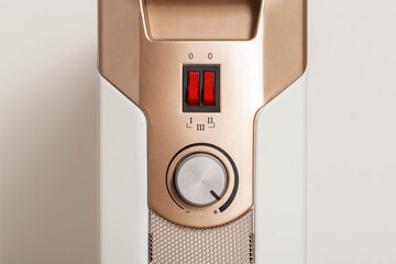 heating temperature control panel, heater on and off buttons. The concept of indoor heating with...