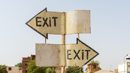 Two exit sign at an Egyptian temple