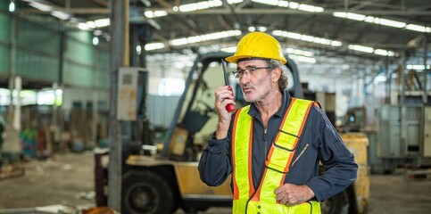man engineer technician worker talk call by use mobile radio walkie talkie communicate speak to...