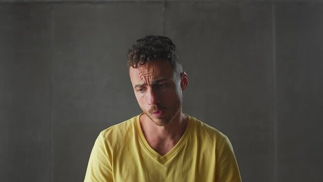 Theatrical Pout: A Playful Display of Feigned Offense by an Expressive Actor