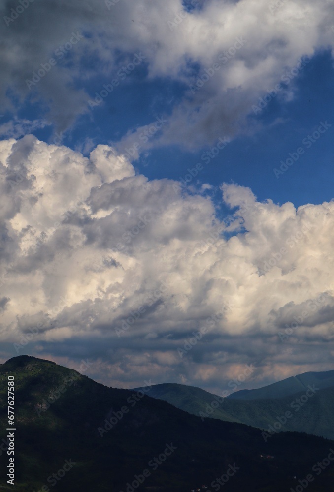 Wall mural clouds over the mountains