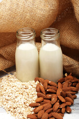 Alternative types of milks. Vegan substitute dairy milk. almond and oat