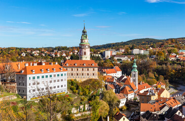 Fototapeta na wymiar View of historical center of Cesky Krumlov town on Vltava riverbank on autumn day, Czechia.