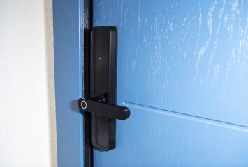 Modern electronic reliable door lock using an access password and a card. High burglary protection. Copy space for text