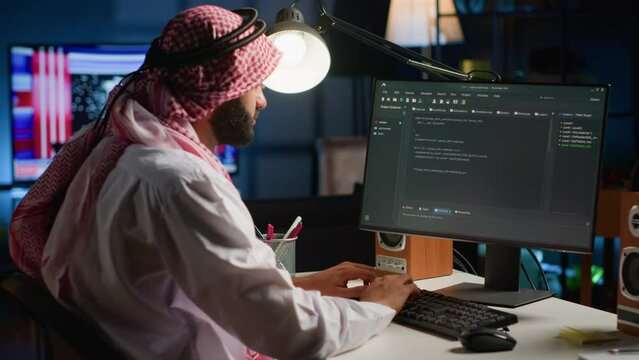 Experienced programmer writing code on computer screen while in office using Java programming languages. Developer working on fixing database errors while working from home