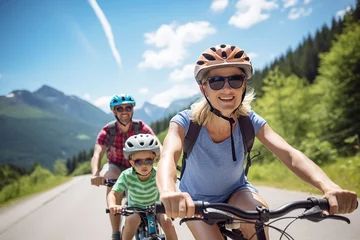 Foto op Plexiglas Cycling family of three in mountain road © Slepitssskaya