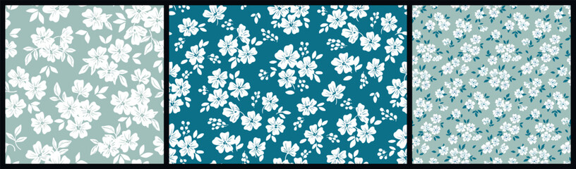 Seamless floral pattern, liberty ditsy print with rustic motif in the collection. Cute botanical design with simple hand drawn plants: small white flowers, tiny leaves on a blue background. Vector.