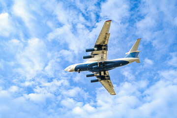 An airplane flying low during landing