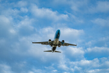 An airplane flying low during landing