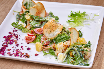 caesar salad on plate closeup