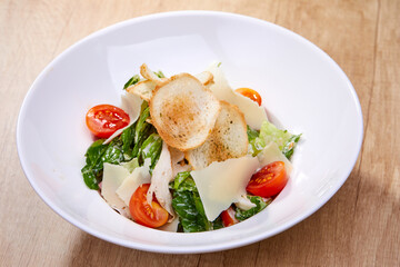 caesar salad on the plate