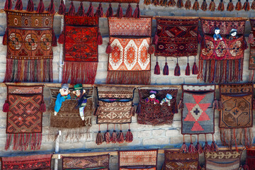 Traditional Uzbek carpets on the wall in a gift shop