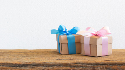 Brown gift box on wood table background