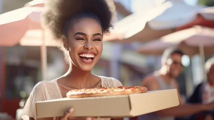 Foto op Canvas Smiling young happy woman hold cardboard box of hot pizza and enjoying. Creative advertising banner for a pizzeria.  © IndigoElf