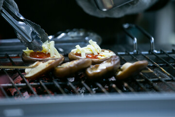 Japanese Shiitake mushrooms cooked tomato sauce at a street food stand in Tokyo.