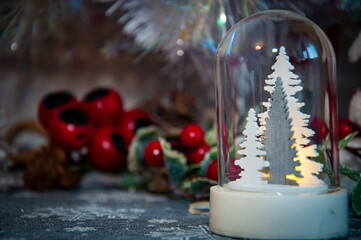 Christmas Tree Background. New Year Banner Composition. Balls On Christmas Tree. New Year Concept. Festive Christmas Decoration. Interior Christmas. Magic Glowing Tree. Fireplace And Gifts. Snowglobe