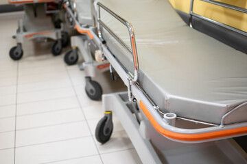 Paramedic Hospital bed or stretcher with blurred background of corridor on ground floor