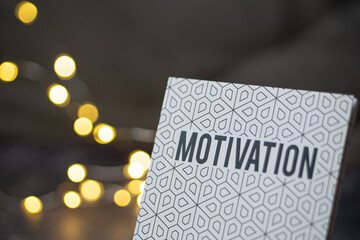 Carnet de motivation avec fond en bokeh