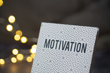 Carnet de motivation avec fond en bokeh