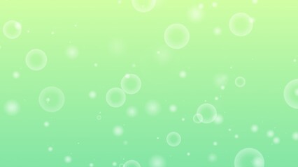 グリーンのグラデーションの玉ボケ背景画像