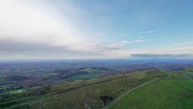 Beautiful Aerial view of flying across the Malvern Hill, Great Malvern, Worcestershire. Autumn season, overcast day