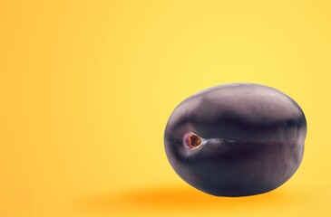 Purple fresh ripe plum fruit