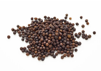 Pile of black pepper peppercorn seeds isolated on white background