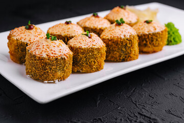 Warm sushi rolls with tempura cream cheese