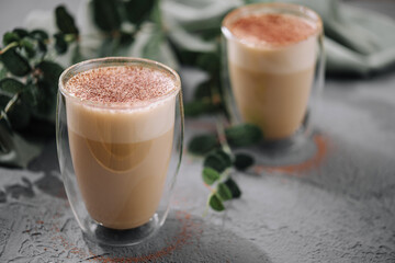 Hot coffee with milk in glass cup