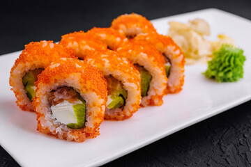 Macro shot of california maki sushi rolls with rice